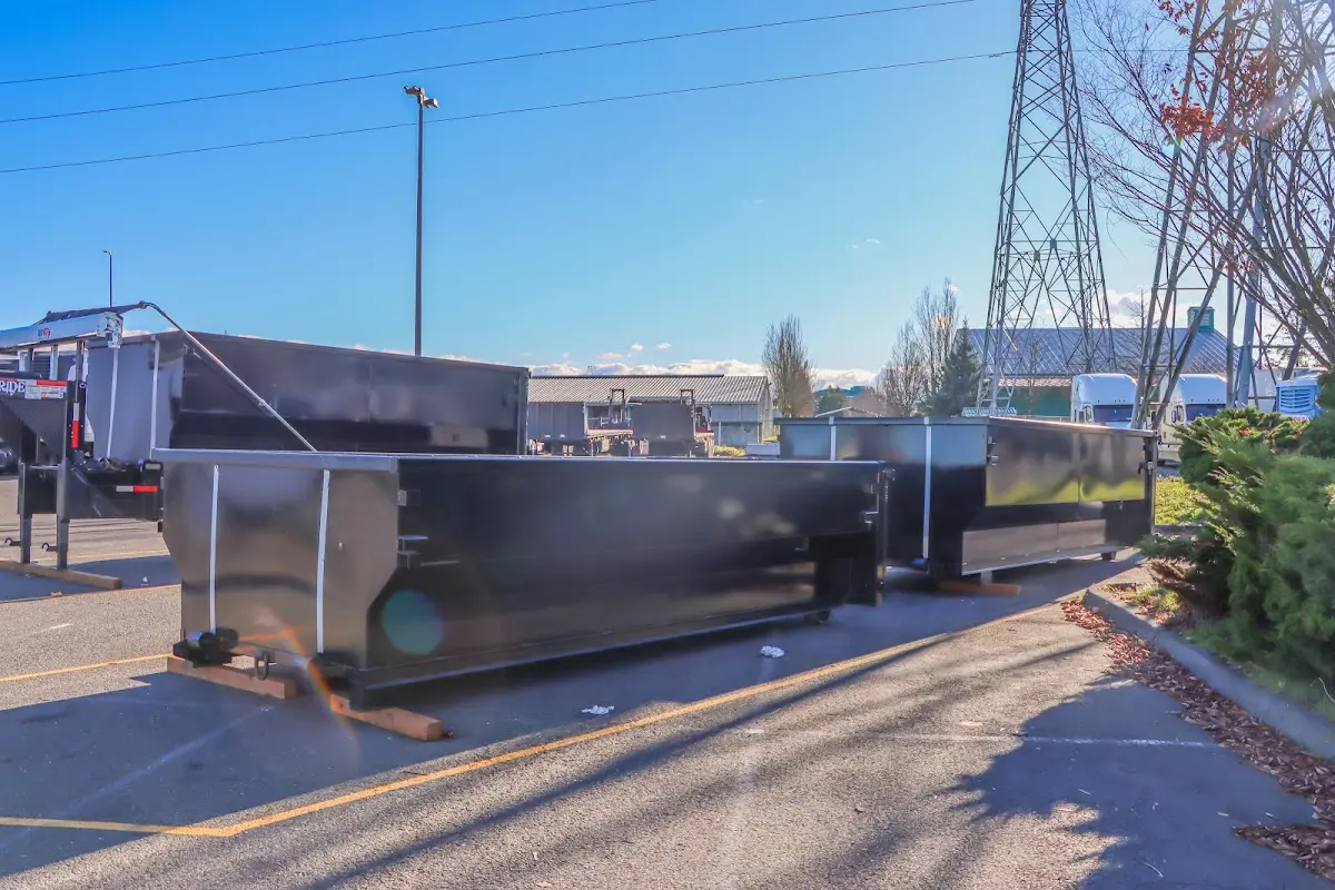 Roll-off dumpster ready for waste disposal at job site for Construction Dumpster Rental in Benton